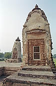 Khajuraho - auxiliary shrine of the Visvanatha temple, with the small Parvati temple on the distance 